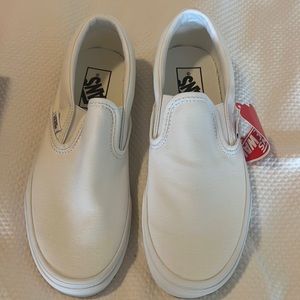 Vans white classic slip ons